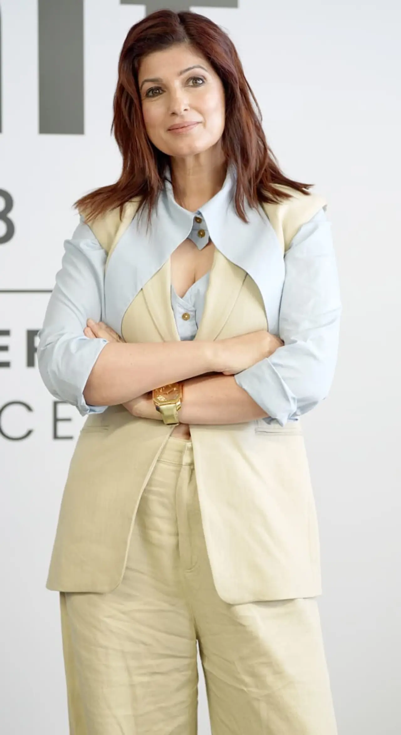 Twinkle Khanna made a charming appearance at an event in a chic beige co-ord set layered over a light blue shirt.